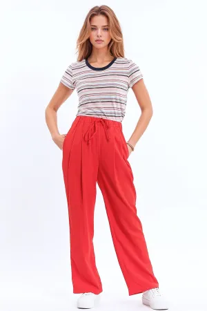 Pants In Coral With Front Pockets And Drawstring Closing